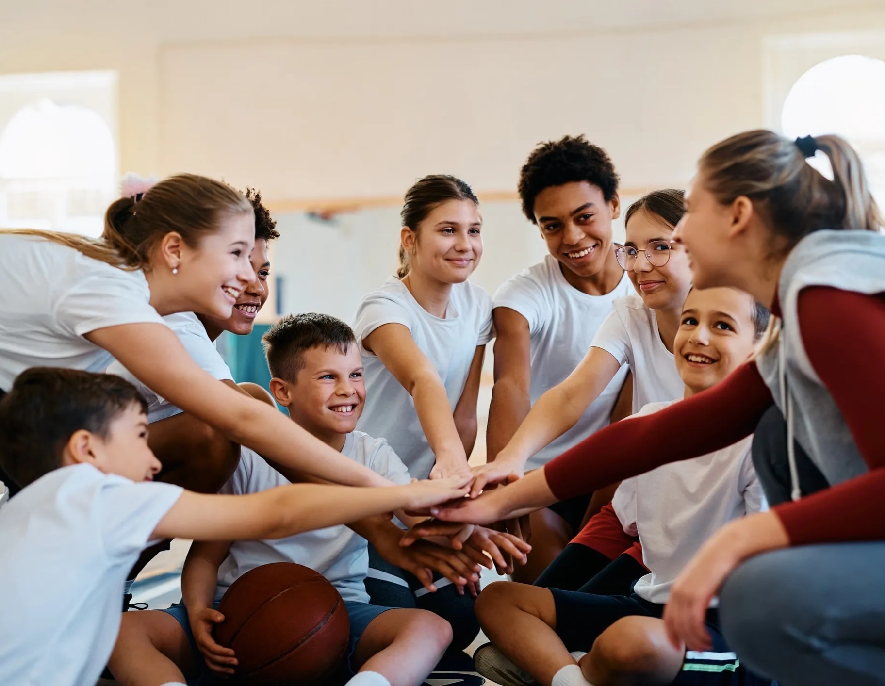 A teacher and students in a community setting